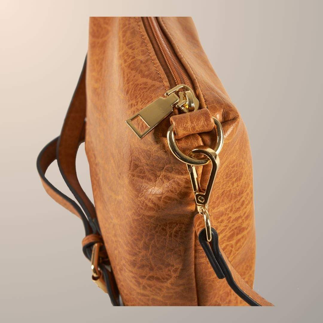 Detalles herrajes del bolso cruzado conjunto tote